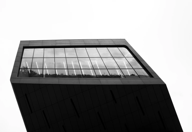 the building is black and white with a window