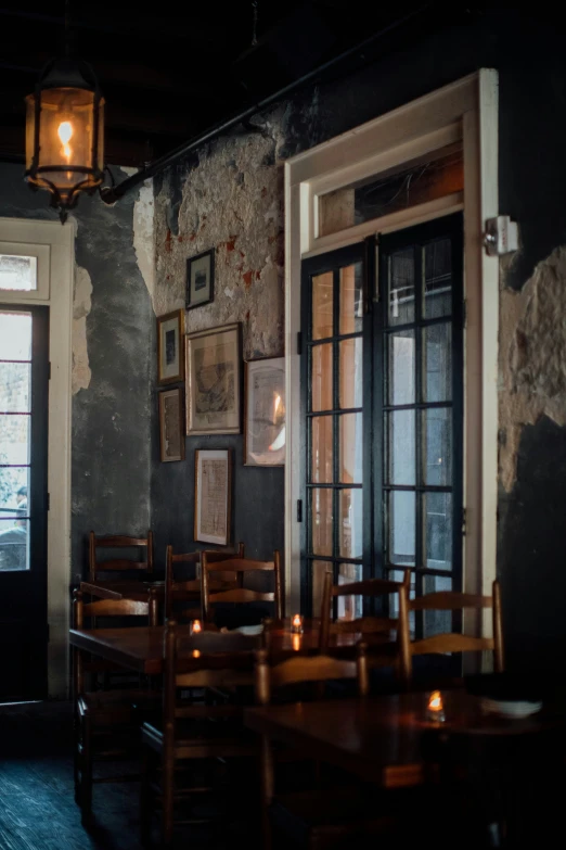 a table and chairs inside of a restaurant