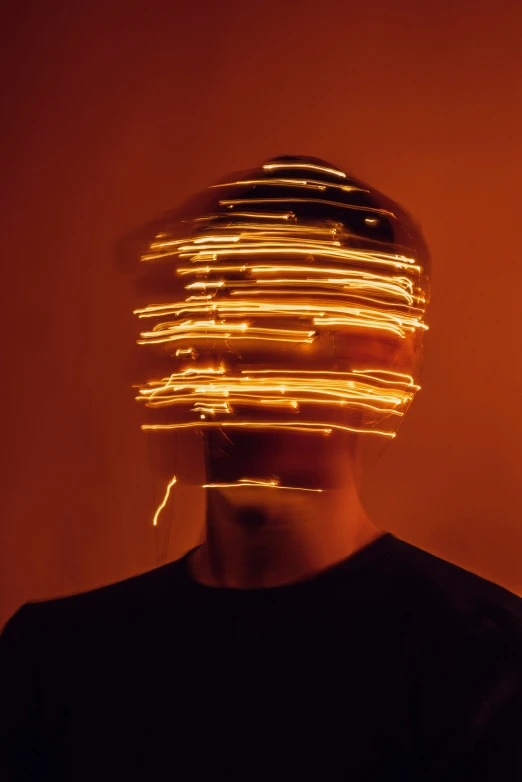 an upside down view of a person's head with light from behind it