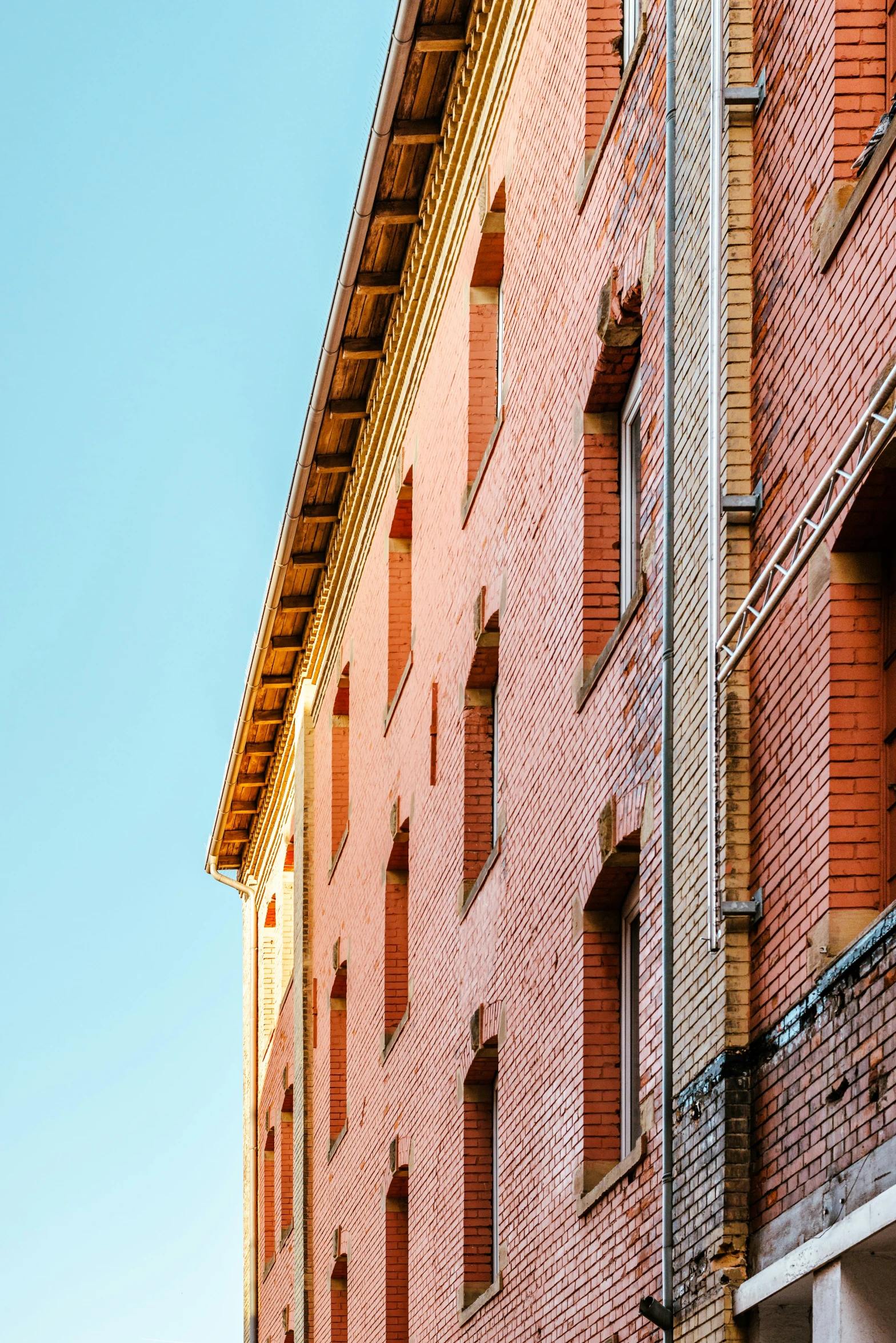 a brick building and sky is very blue