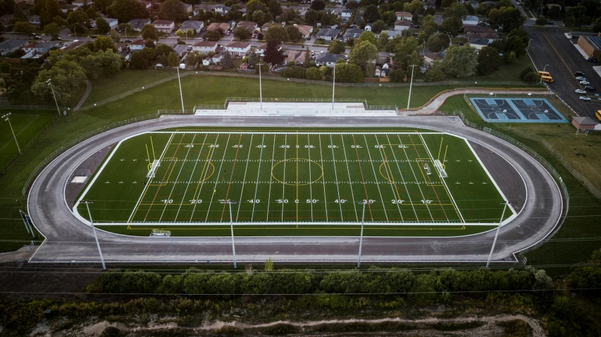 an aerial s of a football stadium with all kinds of equipment in it