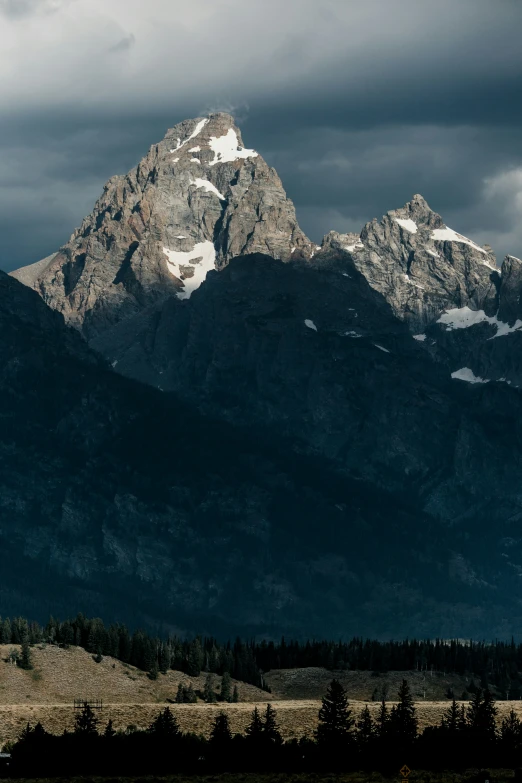 a mountain range with snow on the tops