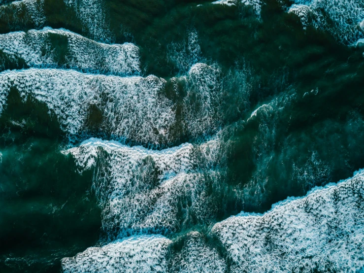 an aerial view of the top part of an ice covered river