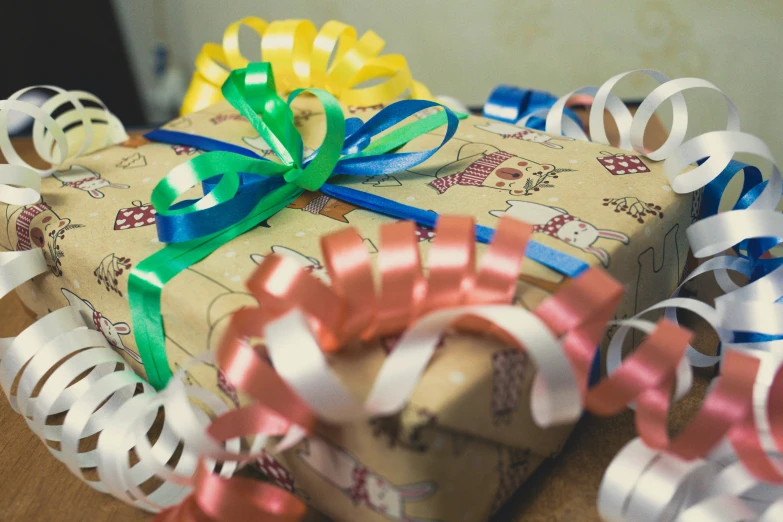 a rolled up present sitting on top of a box