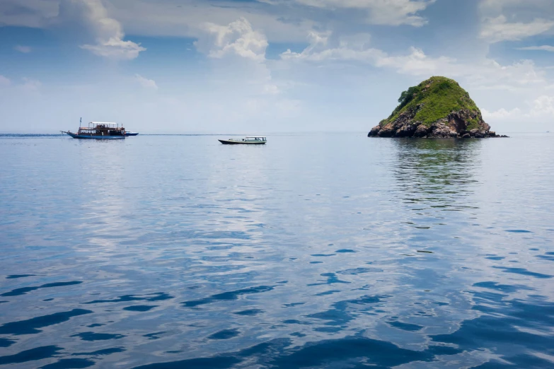 two small islands in a body of water