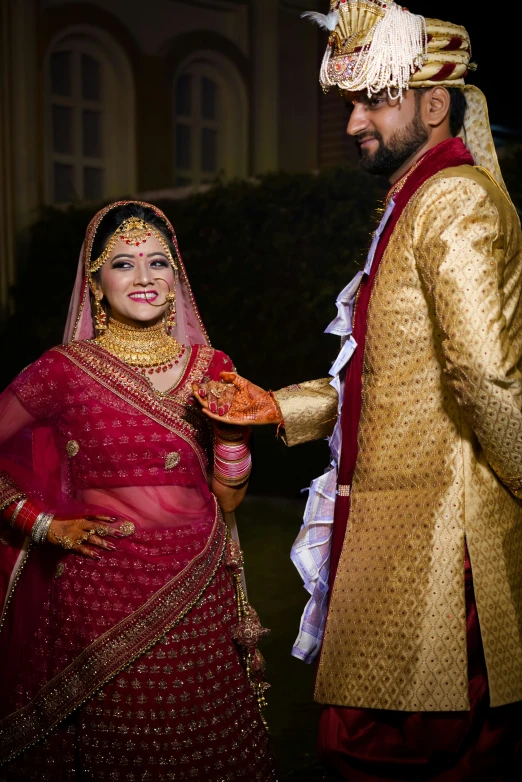 couple in traditional indian garb, standing together