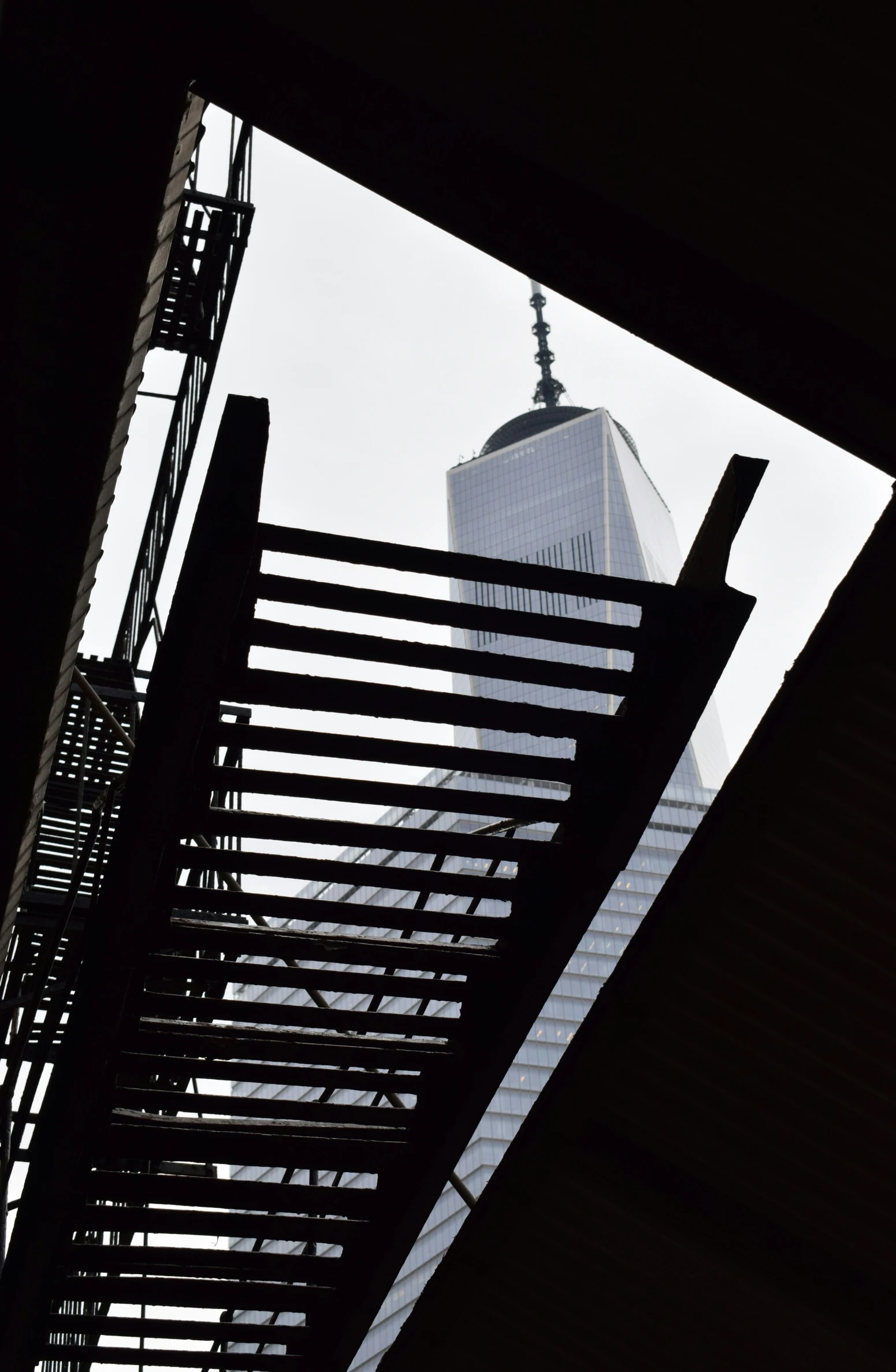 an elevated building with a view from the bottom