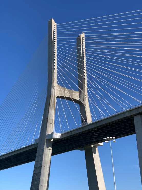 a large bridge is shown with the sky in the background