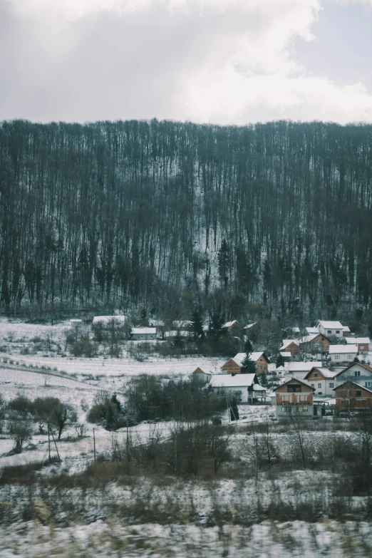 a snow covered village on a ski slope