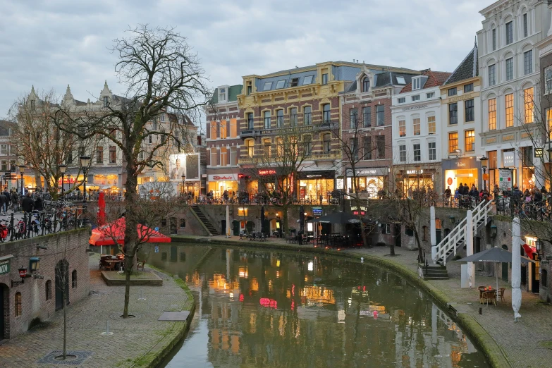 a waterway in the middle of a city at dusk