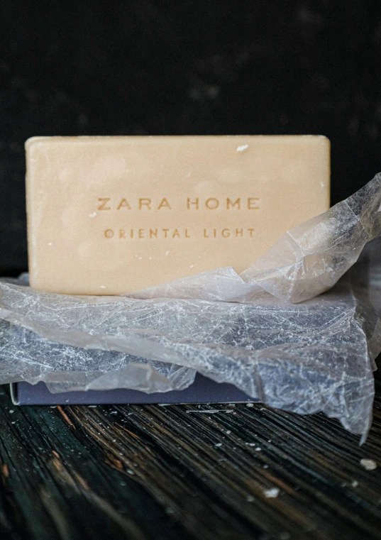 a soap bar that is being wrapped in plastic