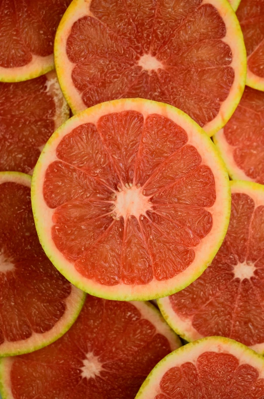 gfruit cut into slices in a large bunch