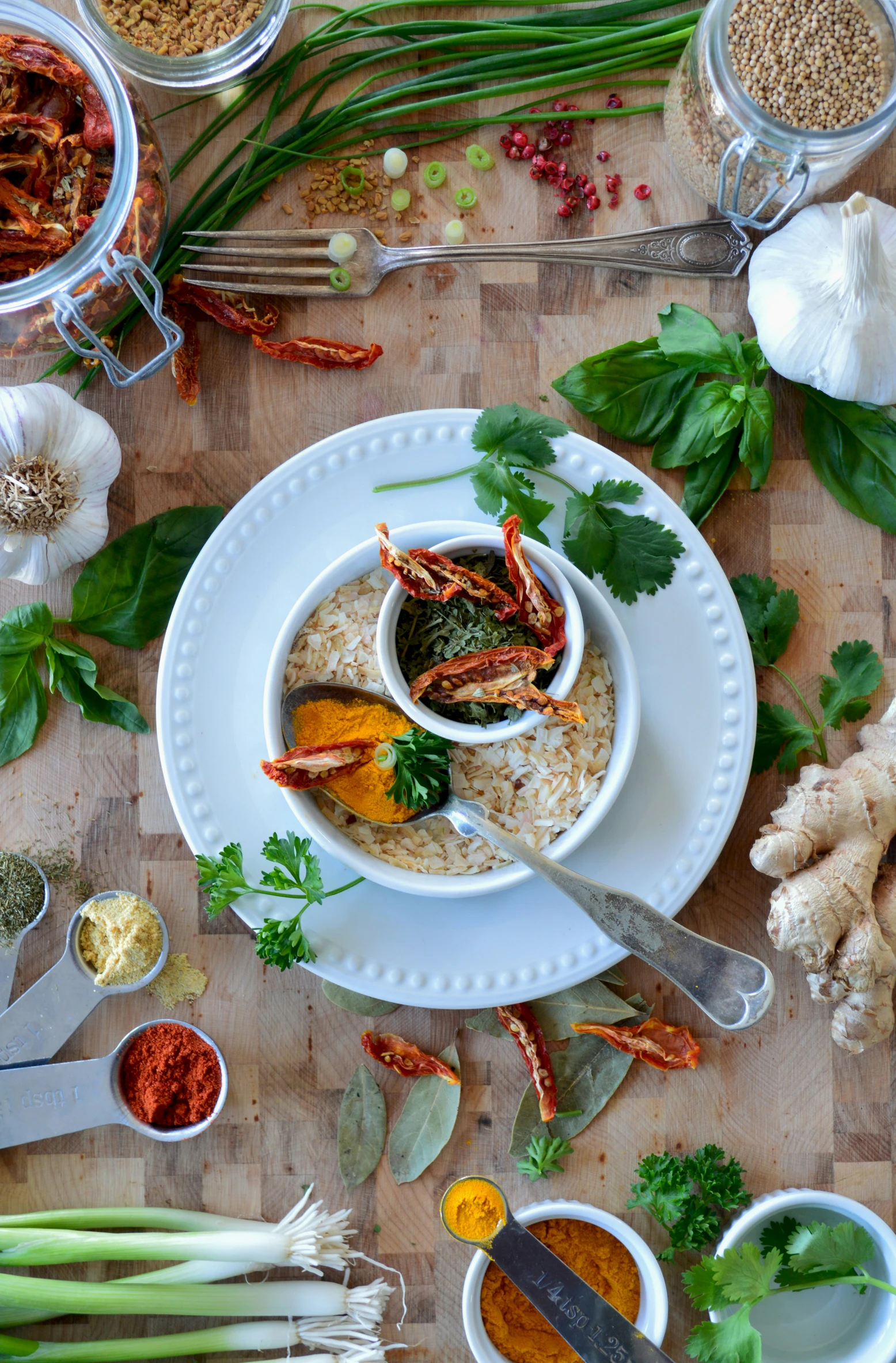 there is an assortment of ingredients and vegetables on the table