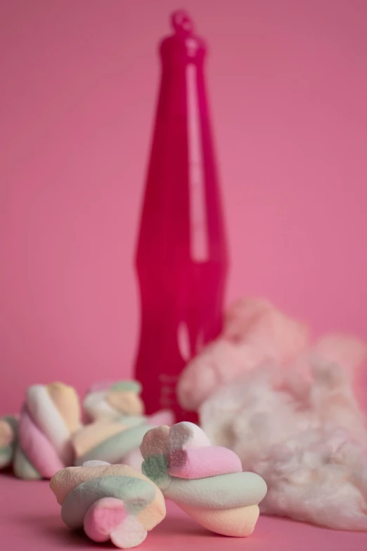 pink vase and candy candy with white smoke