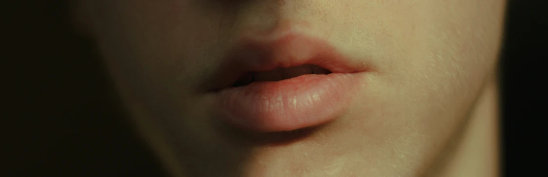 an image of the lips of a woman