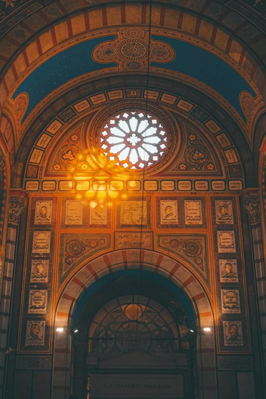 the inside of a very old building with an arch