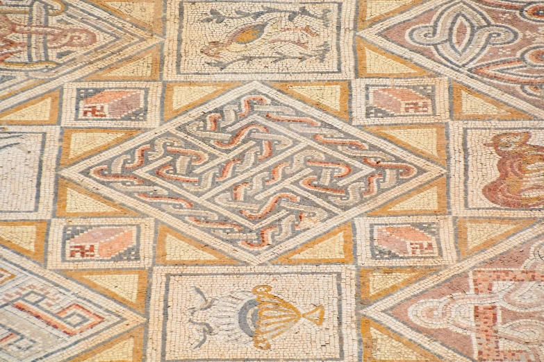 a close up of an old style mosaic