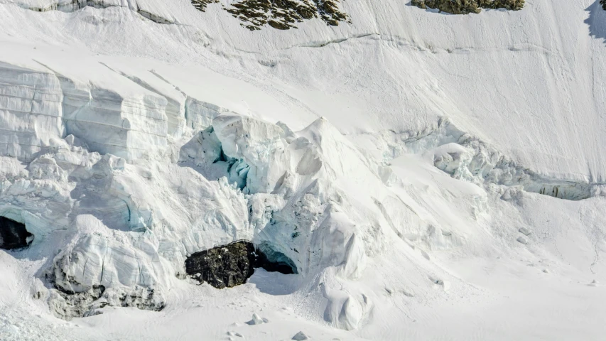 an aerial view of an area in the snow with a large amount of ice