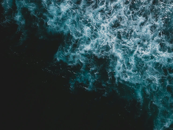 a black and white po of the ocean waves