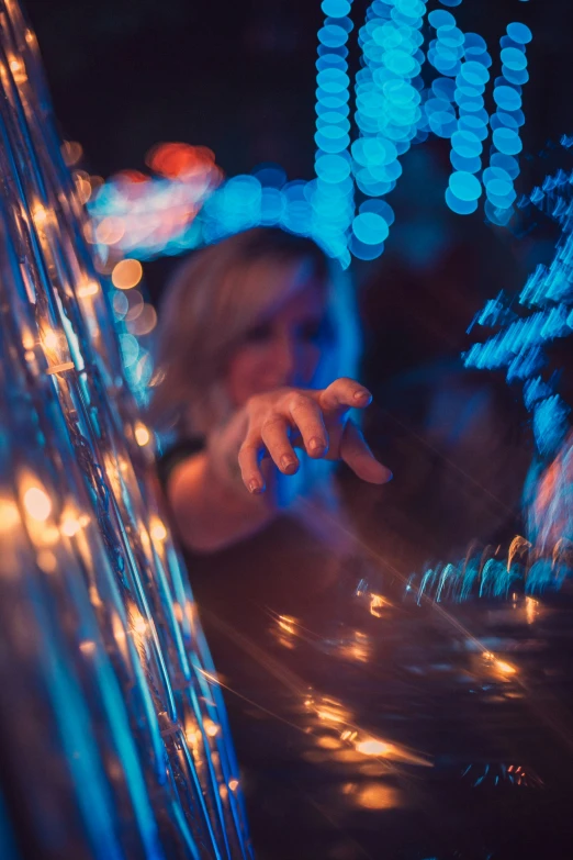 a blurry po of a young woman in nightclub