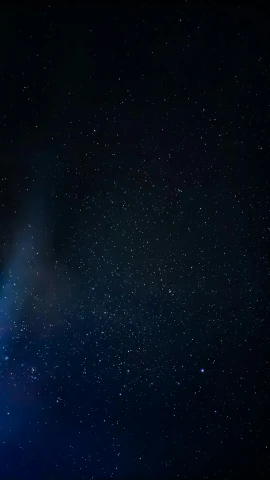 a dark blue space is covered in stars