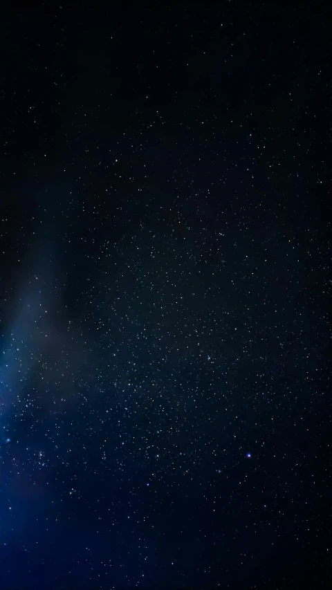 a dark blue space is covered in stars