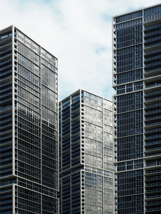 many modern building made of glass in a city