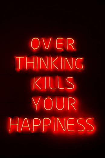 a neon sign with a red sign saying over thinking  your happiness