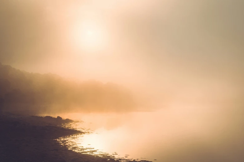 the image of sunlight on the side of the water