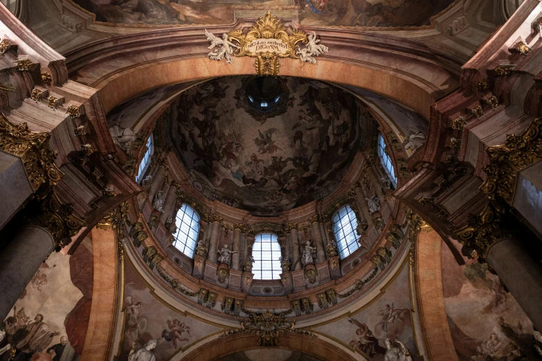 view inside an ornate, painted and stoned church