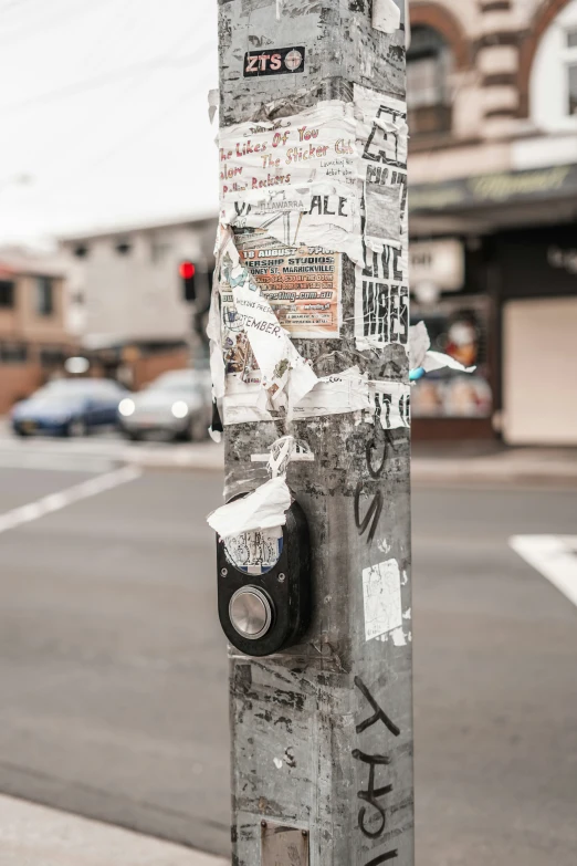 an old parking meter has graffiti on it