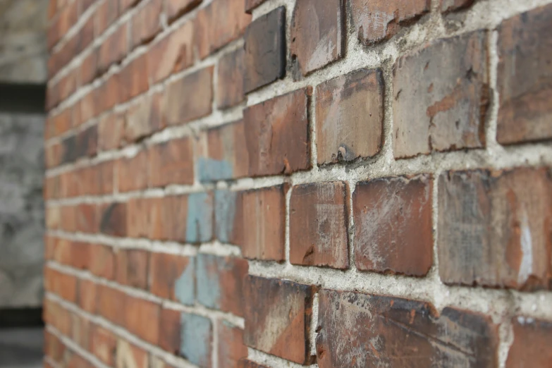 a close up of an old brick wall