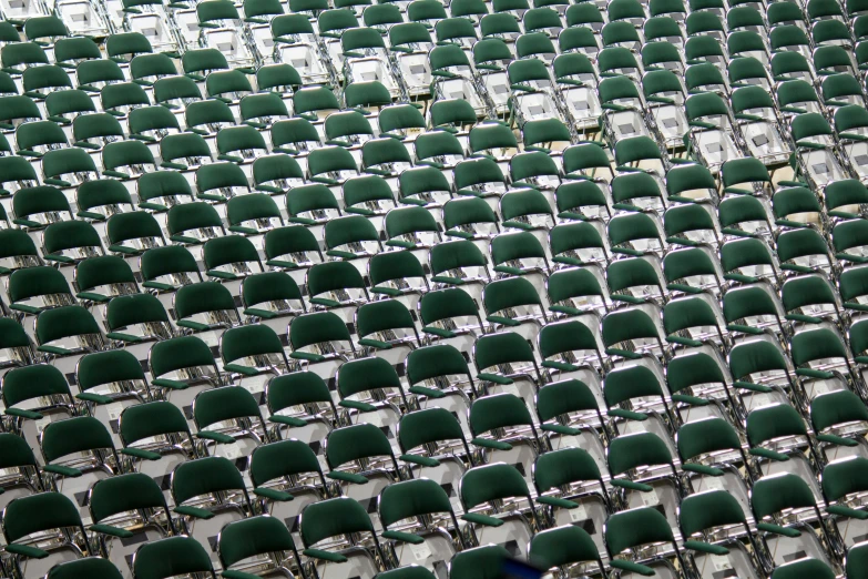 a big array of chairs are lined up