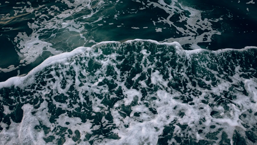 the aerial view of a body of water from a ship