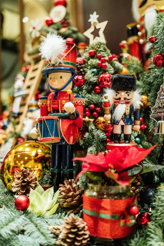 toy soldiers on display near christmas trees