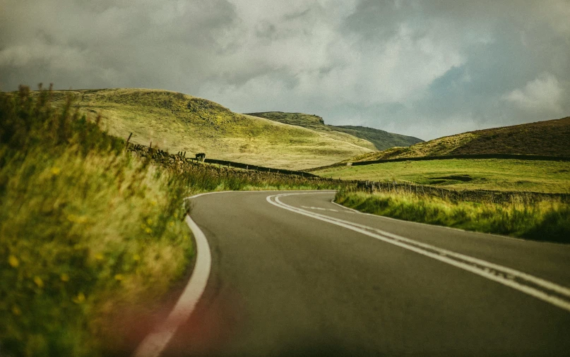 the landscape is full of green hills and rolling hills