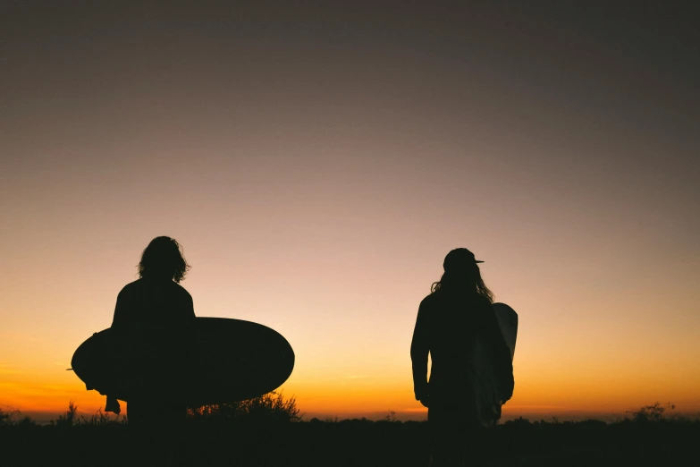 a couple of people that are standing near one another