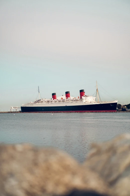 the cruise ship is anchored in the water