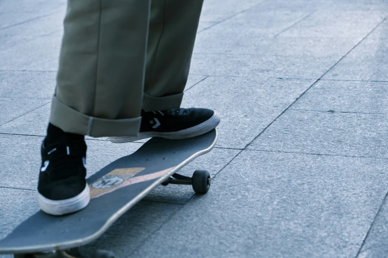 closeup view of feet on a skate board