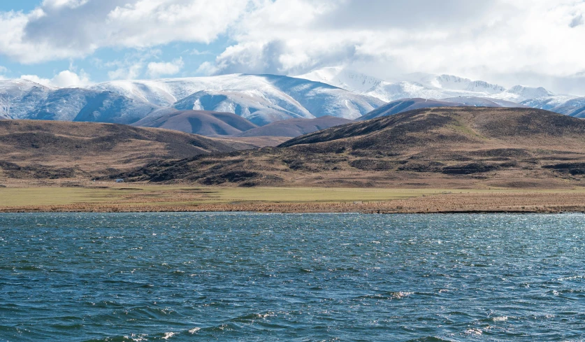 the landscape is shown in the middle of a lake