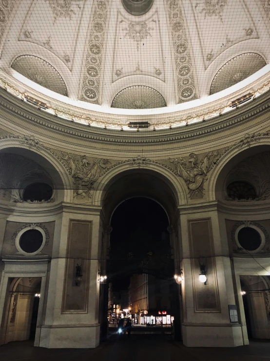 inside an architectural building with light from behind