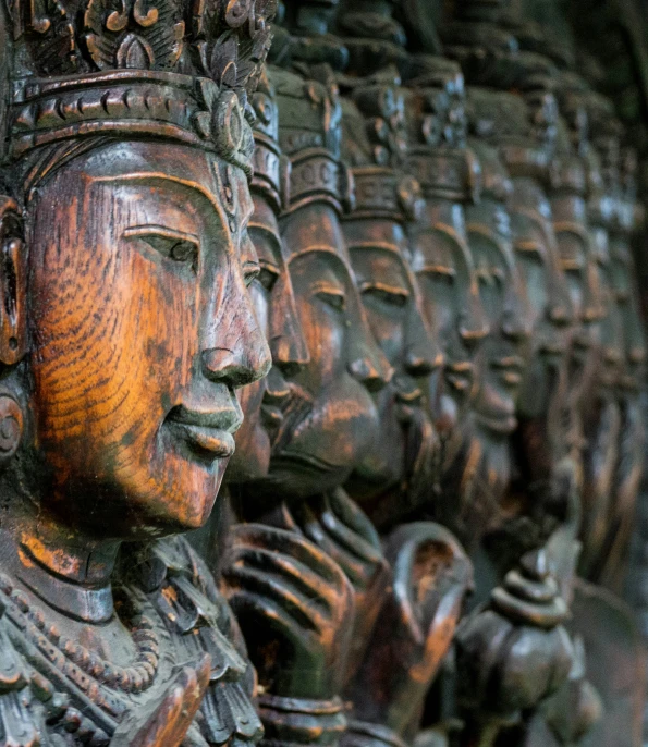 carvings on the side of a building that are in bronze