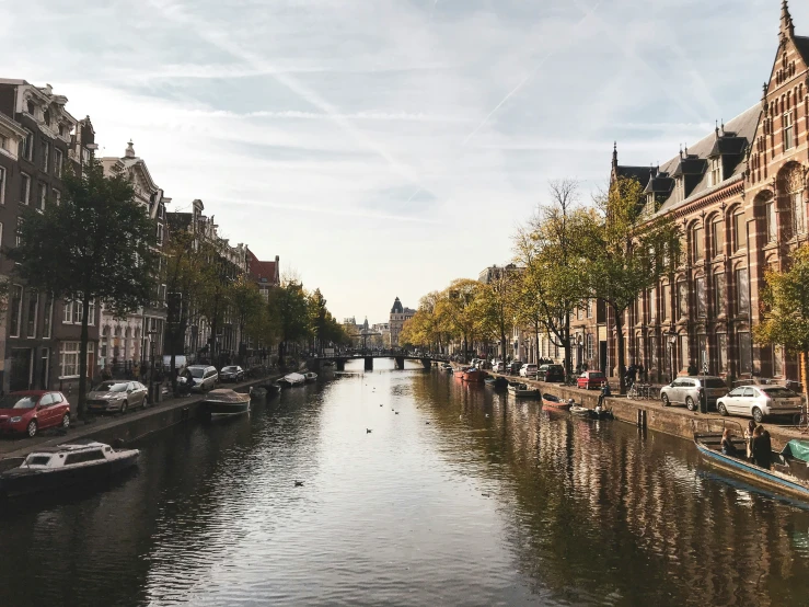 a waterway runs through the middle of a large city