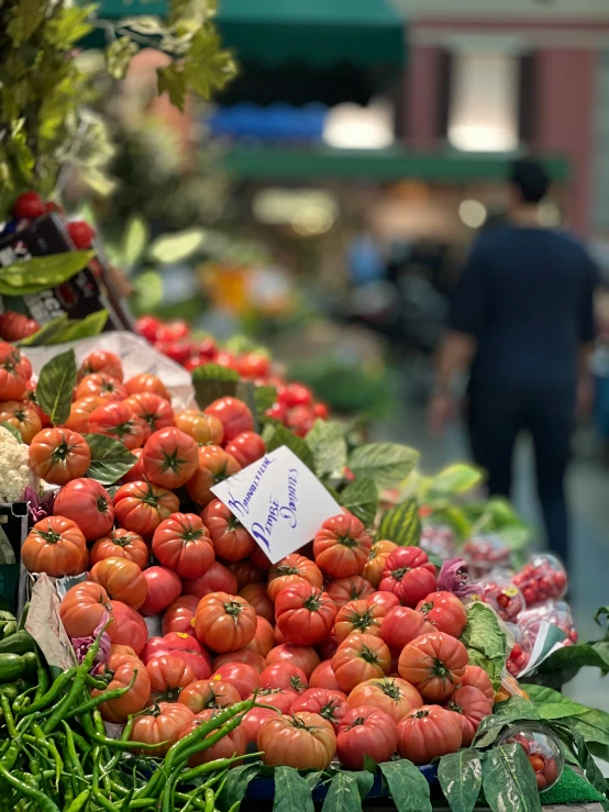 the large arrangement of tomato's is for sale at the market