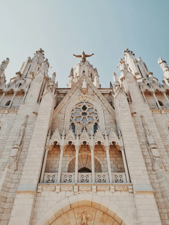 a very big building with a cross on top