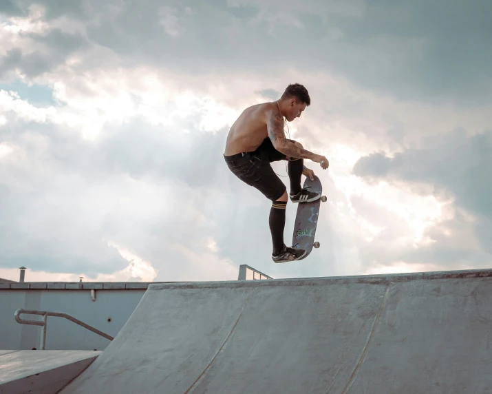 a man that is on a skateboard jumping in the air