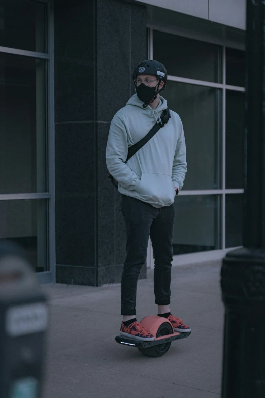 a man riding on top of a skateboard