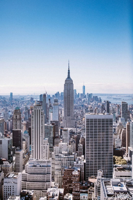 the top of a tall building in the city