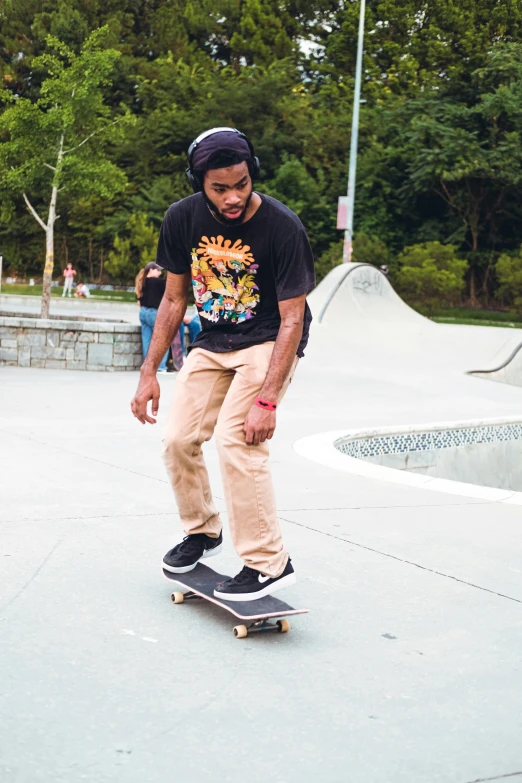 a man is riding his skateboard in a skate park