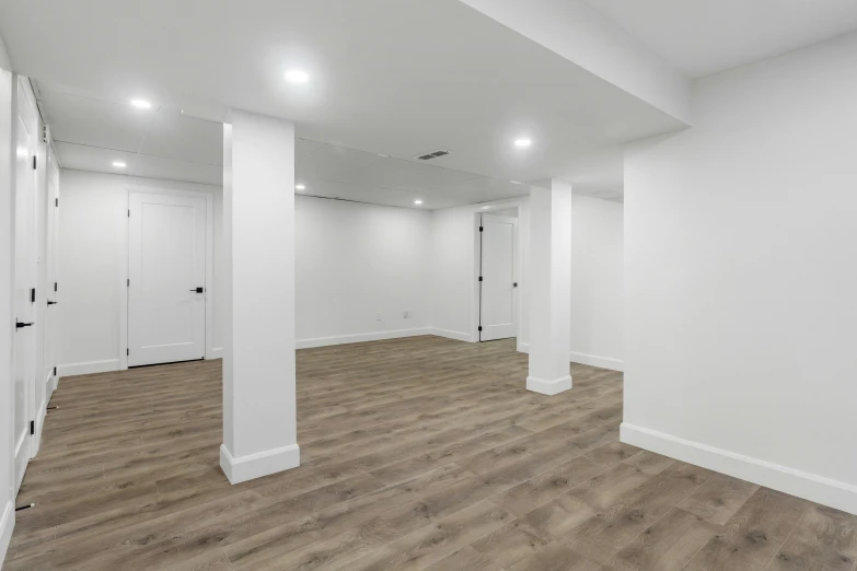 a room with some floors and white walls